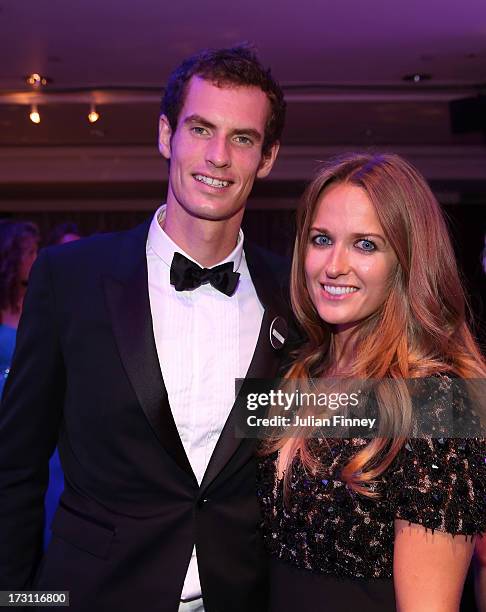 Gentlemen's Singles Champion Andy Murray of Great Britain poses with his girlfriend Kim Sears during the Wimbledon Championships 2013 Winners Ball at...