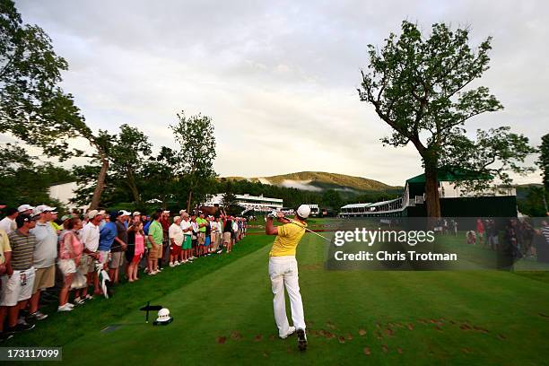 Jonas Blixt of Sweden watches his tee shot on the 18th hole during the final round of the Greenbrier Classic at the Old White TPC on July 7, 2013 in...