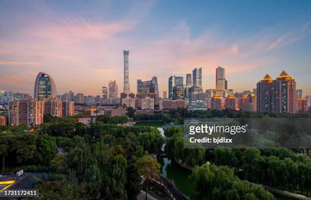 the magnificent and beautiful skyline of beijing under the setting sun - beijing cctv tower stock pictures, royalty-free photos & images