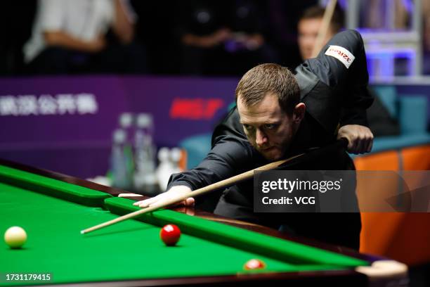 Mark Allen of Northern Ireland plays a shot in the Round of 16 match against Jack Lisowski of England on day 4 of 2023 Wuhan Open at Wuhan Gymnasium...