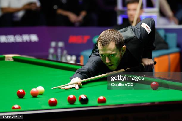 Mark Allen of Northern Ireland plays a shot in the Round of 16 match against Jack Lisowski of England on day 4 of 2023 Wuhan Open at Wuhan Gymnasium...