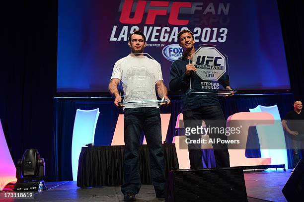 Forrest Griffin and Stephan Bonnar pose for photos with their UFC Hall of Fame plaques during the UFC Fan Expo Las Vegas 2013 at the Mandalay Bay...