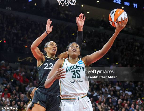 Jonquel Jones of the New York Liberty shoots against A'ja Wilson of the Las Vegas Aces in the third quarter of Game Two of the 2023 WNBA Playoffs...