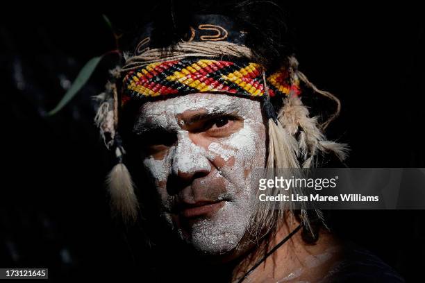 Glen Doyle a member of the Wuriniri Dance Group poses during a public NAIDOC celebration at Hyde Park on July 8, 2013 in Sydney, Australia. NAIDOC is...