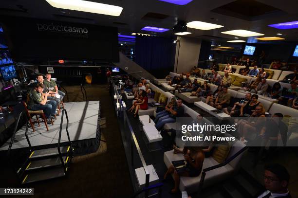Forrest Griffin and Matt Hughes interact with fans during a UFC Fight Week Party at Lagasse's Stadium on July 5, 2013 in Las Vegas, Nevada.