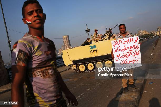Following a day of massive rallies against the ousted Egyptian President and an early morning shooting of pro Mohamed Morsi supporters outside a...
