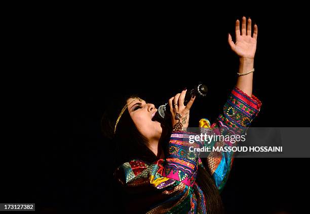 Afghan pop singer Aryana Sayeed performs during a charity concert at the French Culture center in Kabul on July 7, 2013. Fundamentalists in...