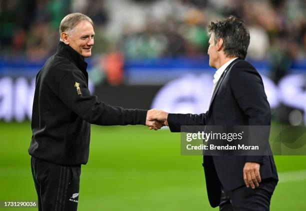 Paris , France - 14 October 2023; New Zealand assistant coach Joe Schmidt, left, and World Rugby head of match officials Joel Jutge before the 2023...