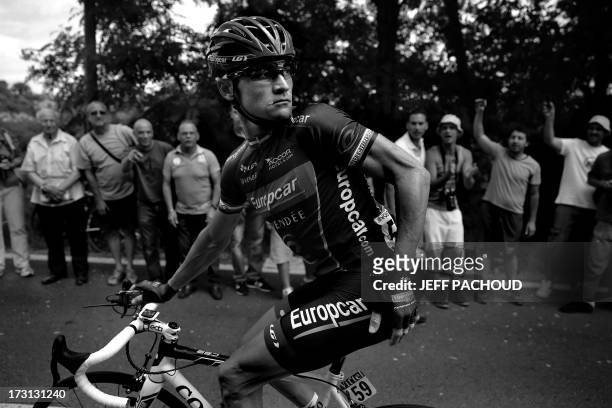 France's Thomas Voeckler rides during the 228.5 km fifth stage of the 100th edition of the Tour de France cycling race on July 3, 2013 between...