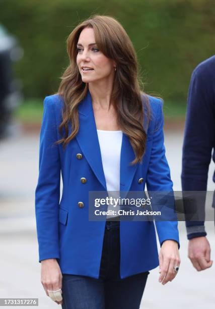 Catherine, Princess of Wales smiles as she arrives for the visit to SportsAid at Bisham Abbey National Sports Centre, with Prince William, Prince of...