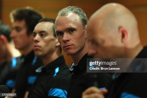 Procycling rider Chris Froome of Great Britain talks to the press at their team press conference at the Hermitage Hotel during the first rest day of...