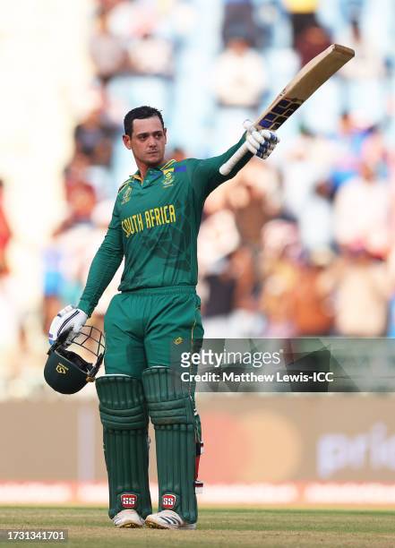 Quinton de Kock of South Africa celebrates their century during the ICC Men's Cricket World Cup India 2023 between Australia and South Africa at...
