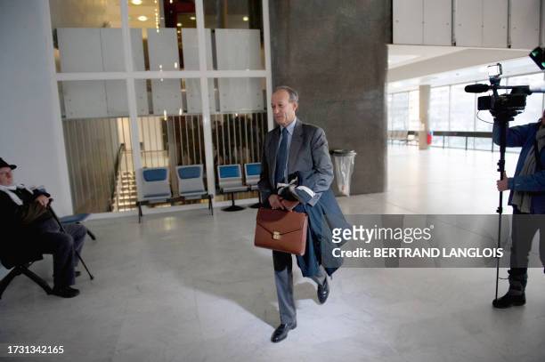 Thierry Gaubert, former advisor of current French President in the 90's, arrives at the Nanterre courthouse on February 6 prior to the opening of his...