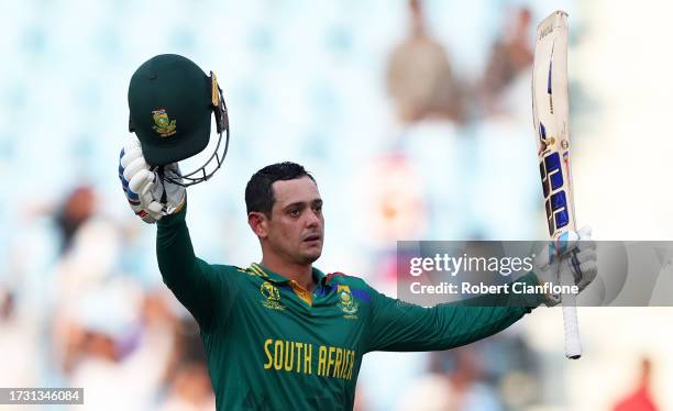 Quinton de Kock of South Africa celebrates their century during the ICC Men's Cricket World Cup India 2023 between Australia and South Africa at...