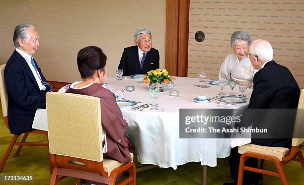 Emperor Akihito and Empress Michiko attend a tea ceremony with the Japan Art Academy award winners at the Imperial Palace on July 8, 2013 in Tokyo,...