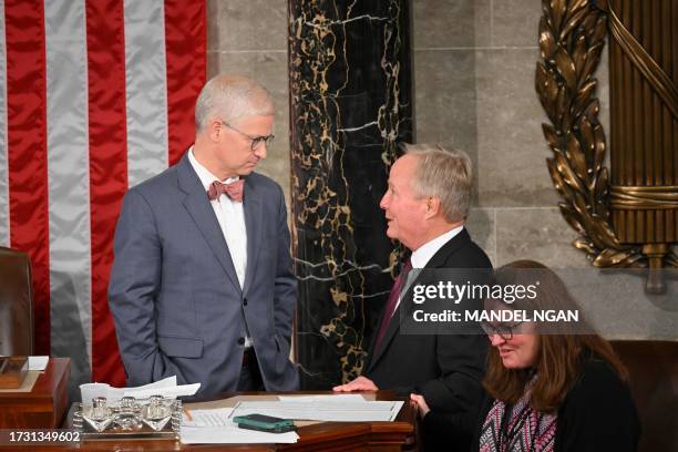 Republican Representative from North Carolina Patrick McHenry speaks with fellow Republican David Joyce of Ohio as the House of Representatives holds...