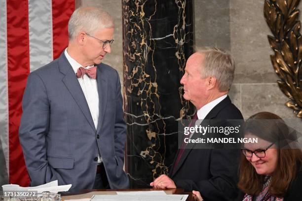 Republican Representative from North Carolina Patrick McHenry speaks with fellow Republican David Joyce of Ohio as the House of Representatives holds...