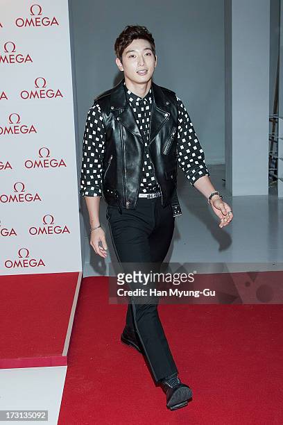 Jinwoon of South Korean boy band 2AM attends the 'OMEGA' Co-Axial Movement Exhibition at Beyond Museum on July 8, 2013 in Seoul, South Korea.