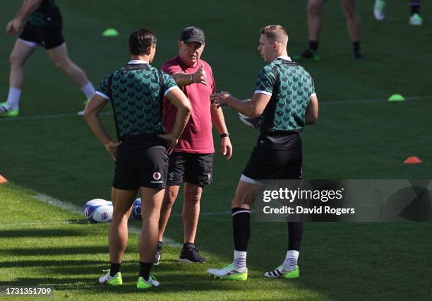 Warren Gatland the Wales head coach talks to Liam Williams and Louis Rees-Zammit lduring the Wales training session at Felix Mayol Stadium on October...