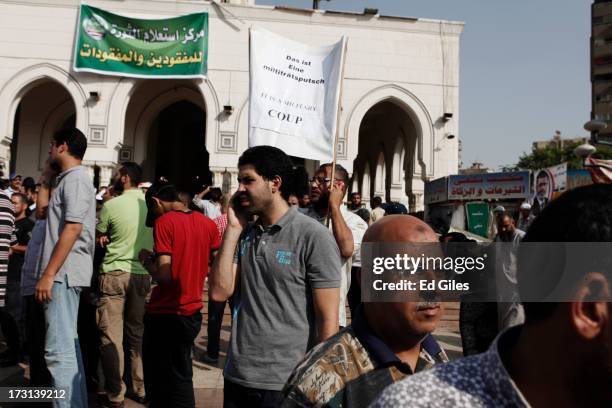 Supporters of deposed Egyptian President Mohammed Morsi attend a demonstration at the Rabaa al-Adweya Mosque in the Nasr City district on July 8,...