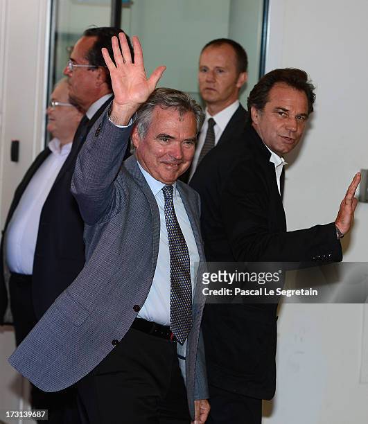 Bernard Accoyer and Renaud Muselier arrive at the UMP headquarters to attend an extraordinary meeting of UMP right-wing opposition party July 8, 2013...