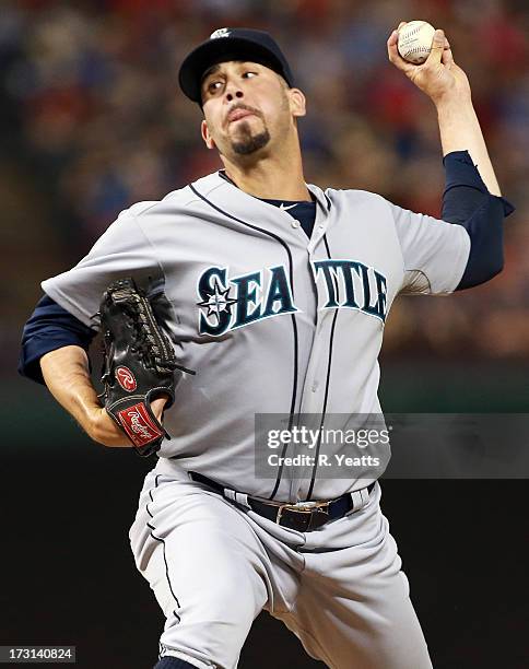 Oliver Perez of the Seattle Mariners pitches in the eighth inning against the Texas Rangers at Rangers Ballpark in Arlington on July 2, 2013 in...