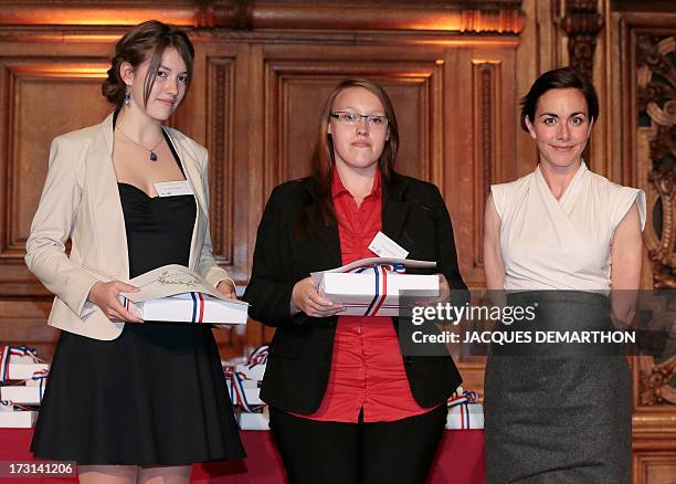 Founder and CEO of CB Group Catherine Barba , stands next to laureates of the ''Concours General'' in the category ''Business'', first-placed Lindsay...