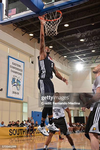 Arnett Moultrie of the Philadelphia 76ers shoots against the Indiana Pacers during the 2013 Southwest Airlines Orlando Pro Summer League on July 8,...