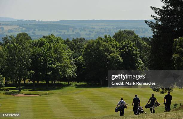 Amateur and pro pairs walk down the 15th fairway during The Lombard Trophy Regional Qualifier at Crieff Golf Club on July 08, 2013 in Crieff,...