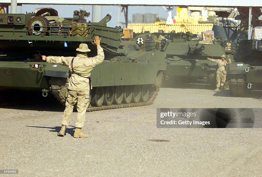 Marines Unload Battle-Gear In Kuwait  