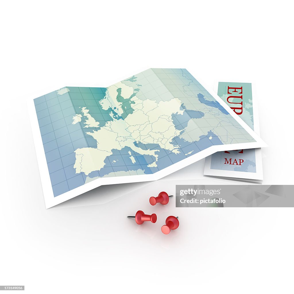 A foldable map of Europe laid open with three red push pins