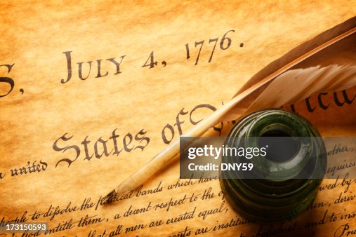 Quill and inkwell on top of Declaration of Independence