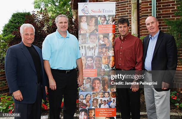 Of Smile Train Bob Toth, New York Islanders General Manager Garth Snow, New York Islanders Coach Jack Capuano and Principal of Skyline Restoration...