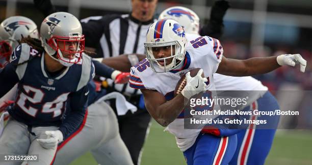 New England Patriots cornerback Stephon Gilmore defends Buffalo Bills running back LeSean McCoy during the fourth quarter of the game at Gillette...