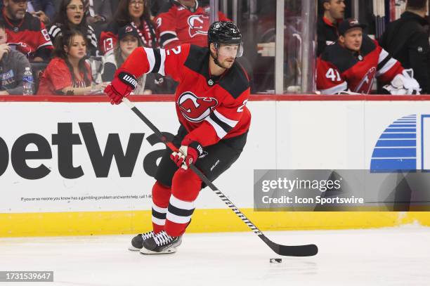 New Jersey Devils defenseman Brendan Smith skates with the puck during a game between the Arizona Coyotes and New Jersey Devils on October 13, 2023...