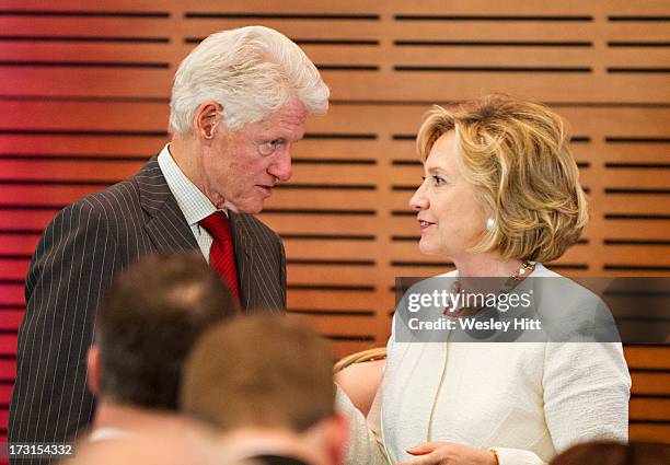 Former President Bill Clinton and Hillary Rodham Clinton attend the Oscar de la Renta: American Icon reception at the William J. Clinton Presidential...