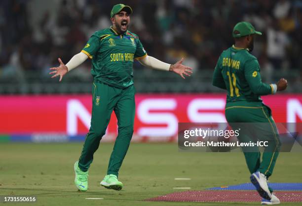 Tabraiz Shamsi and Temba Bavuma of South Africa celebrate the wicket of Mitchell Marsh of Australia during the ICC Men's Cricket World Cup India 2023...