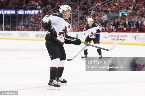 Arizona Coyotes right wing Clayton Keller skates during a game between the Arizona Coyotes and New Jersey Devils on October 13, 2023 at Prudential...