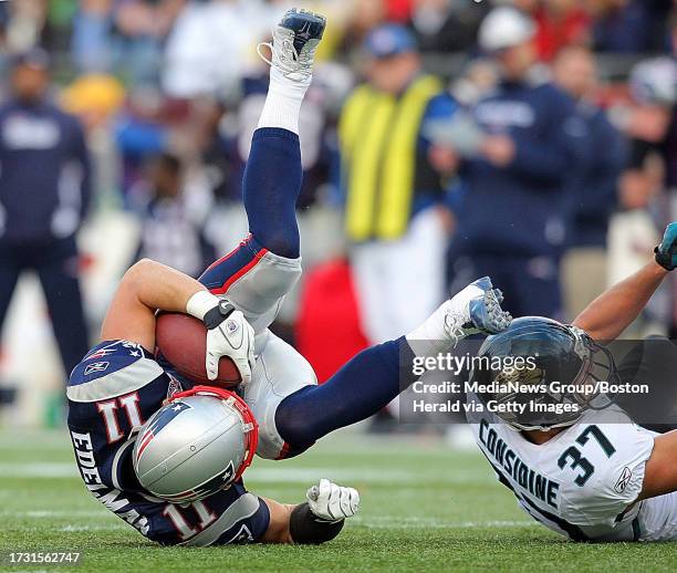New England Patriots Vs. Jacksonville Jaguars at Gillette Stadium. New England Patriots wide receiver Julian Edelman holds onto the ball after...