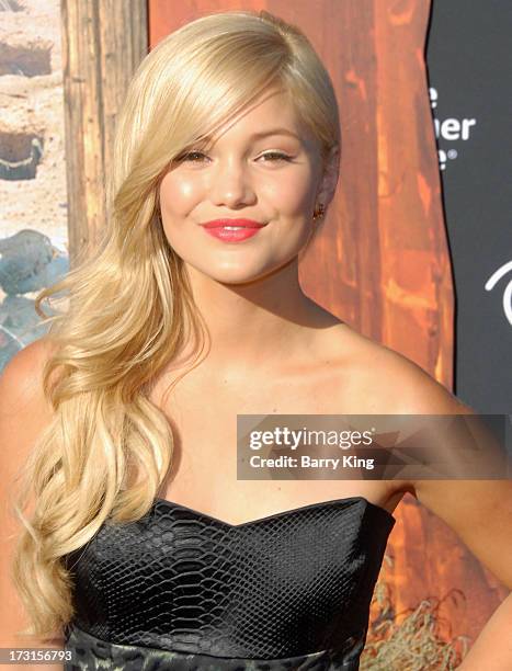 Actress Olivia Holt arrives at the Los Angeles premiere 'The Lone Ranger' at Disney California Adventure Park on June 22, 2013 in Anaheim, California.