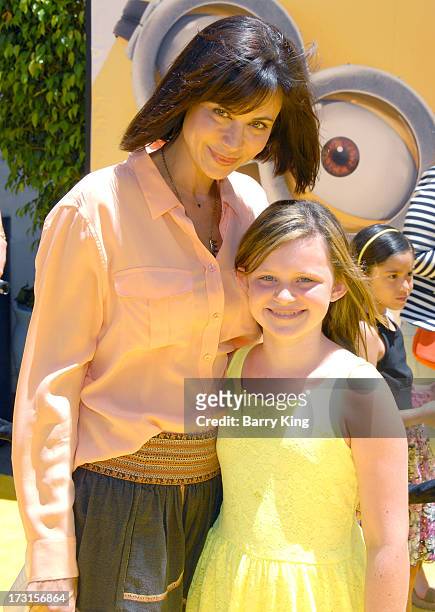 Actress Catherine Bell and daughter Gemma Beason arrive at the Los Angeles premiere of 'Despicable Me 2" held at Universal CityWalk on June 22, 2013...