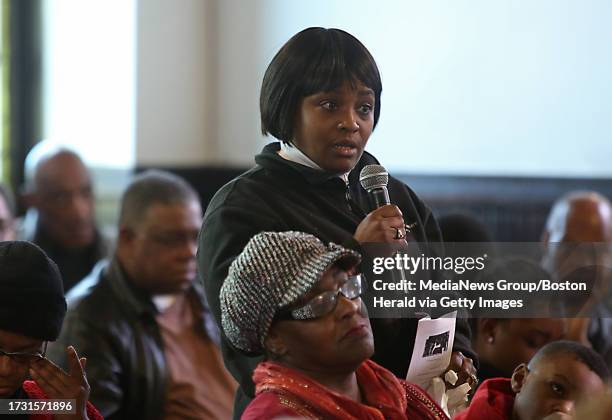 Sabrina Gilliard of Roxbury asks District Attorney Dan Conley a question during the Women Survivors of Homicide event at Bethel Baptist Church....