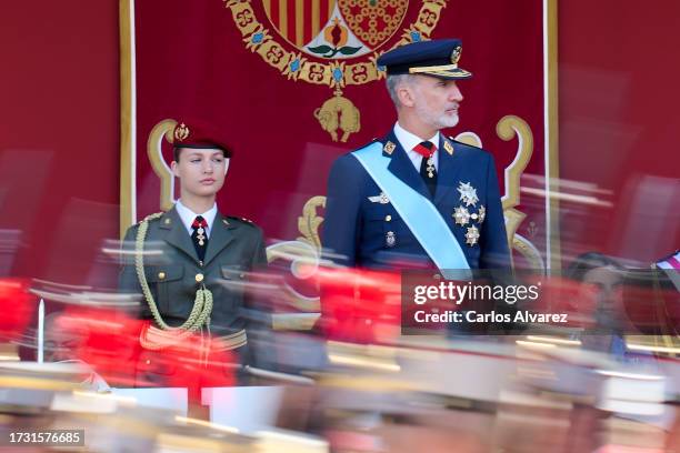 King Felipe VI of Spain and Crown Princess Leonor of Spain attend the National Day Military Parade on October 12, 2023 in Madrid, Spain.