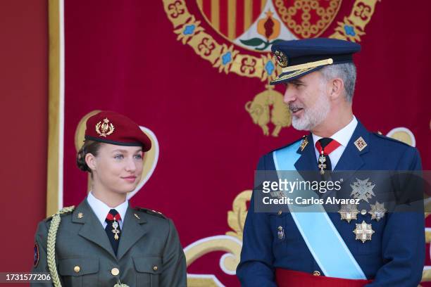 King Felipe VI of Spain and Crown Princess Leonor of Spain attend the National Day Military Parade on October 12, 2023 in Madrid, Spain.