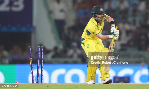 Josh Inglis of Australia is bowled by Kagiso Rabada of South Africa during the ICC Men's Cricket World Cup India 2023 between Australia and South...