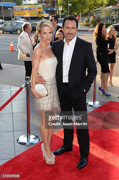Actor Demian Bichir and his wife Lisset Gutierrez arrive at the series premiere of FX's 'The Bridge' at the DGA Theater on July 8, 2013 in Los...