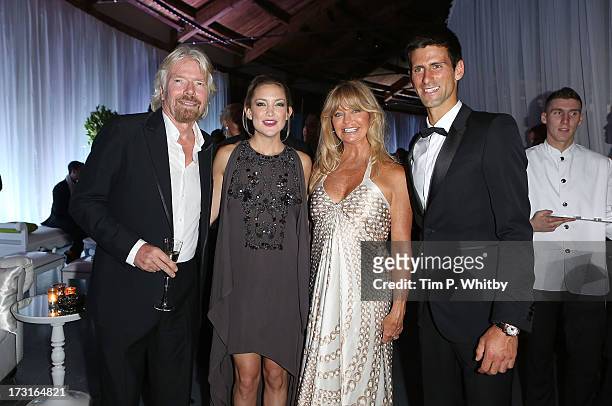 Richard Branson, Kate Hudson, Goldie Hawn and Novak Djokovic attend the Novak Djokovic Foundation inaugural London gala dinner at The Roundhouse on...