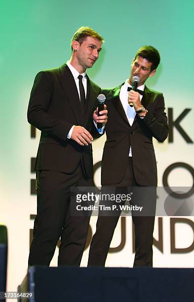 Andre Villas-Boas and Novak Djokovic attend the Novak Djokovic Foundation inaugural London gala dinner at The Roundhouse on July 8, 2013 in London,...