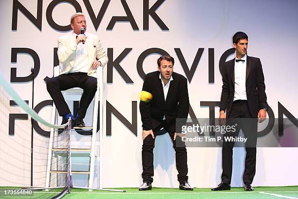 Boris Becker, Jonathan Ross and Novak Djokovic attend the Novak Djokovic Foundation inaugural London gala dinner at The Roundhouse on July 8, 2013 in...