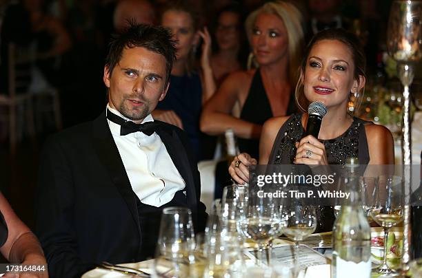 Matt Bellamy and Kate Hudson attend the Novak Djokovic Foundation inaugural London gala dinner at The Roundhouse on July 8, 2013 in London, England....